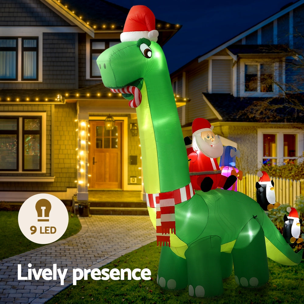 Jingle Jollys 3.8m Christmas Inflatable Santa on Dinosaur