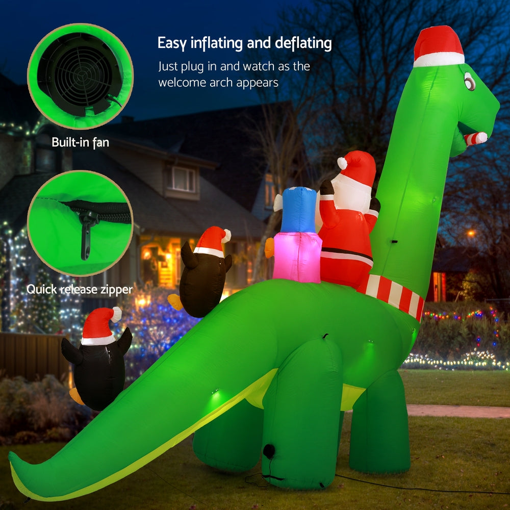 Jingle Jollys 3.8m Christmas Inflatable Santa on Dinosaur