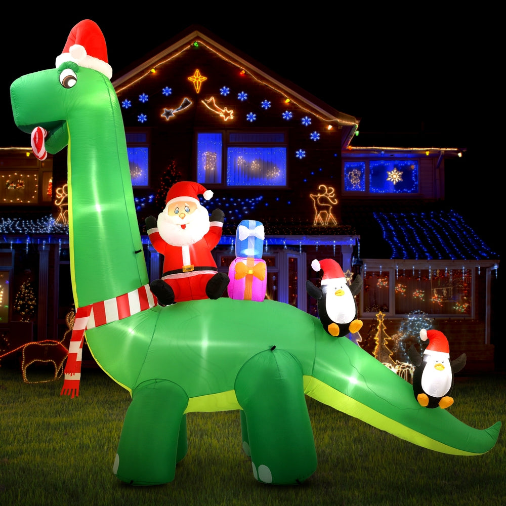 Jingle Jollys 3.8m Christmas Inflatable Santa on Dinosaur